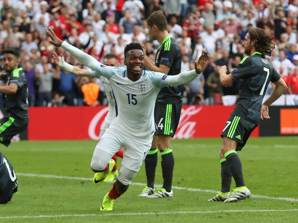 Daniel Sturridge turns to celebrate of his injury-time winner against Wales
