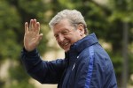 Hodgson waves to Three Lions fans as the team arrive in Chantilly