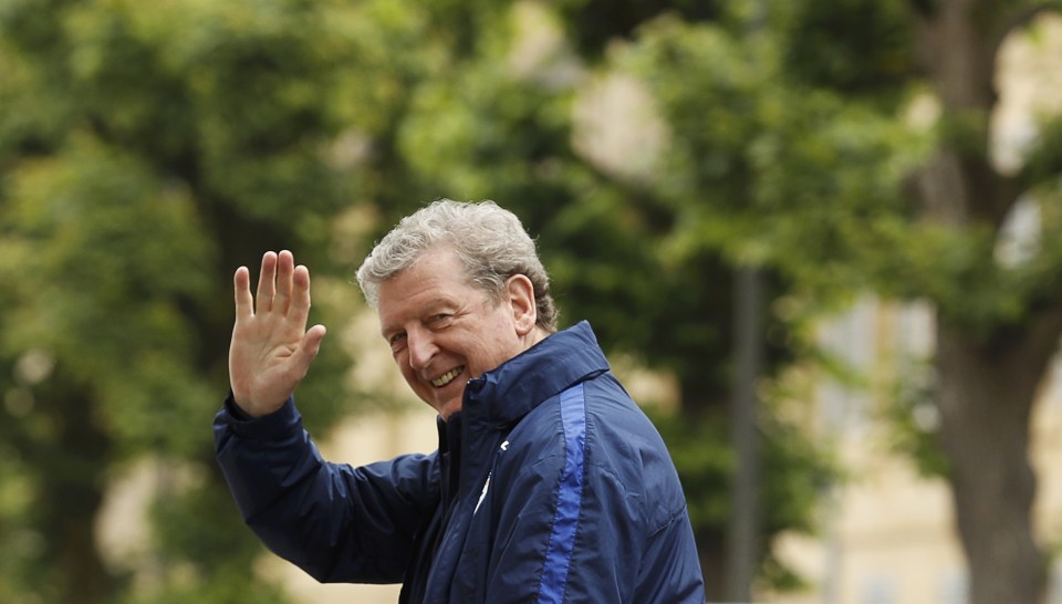 Hodgson waves to Three Lions fans as the team arrive in Chantilly