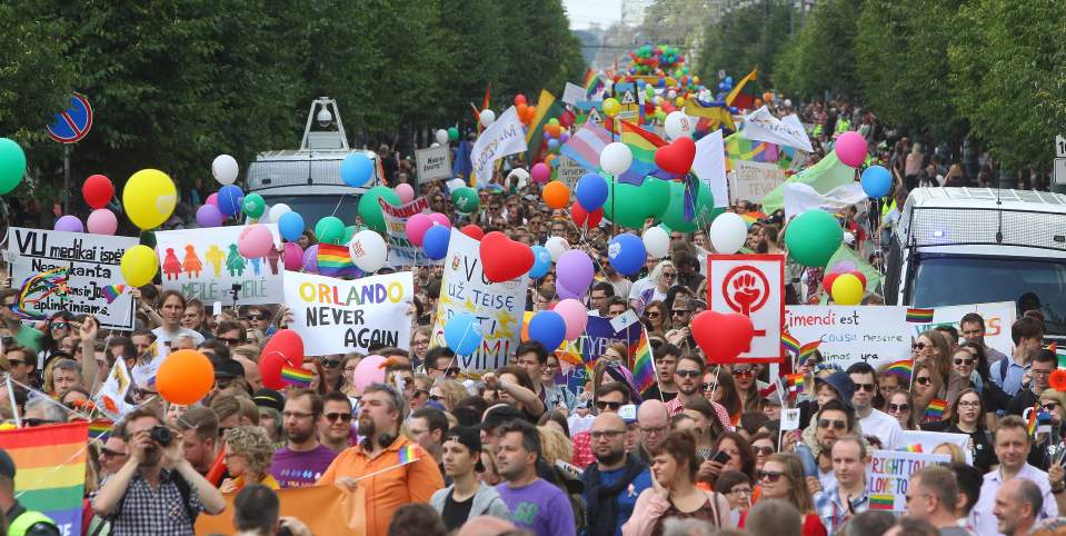 Thousands turn out to a Pride march to raise awareness against homophobia and show solidarity with the LGBT community
