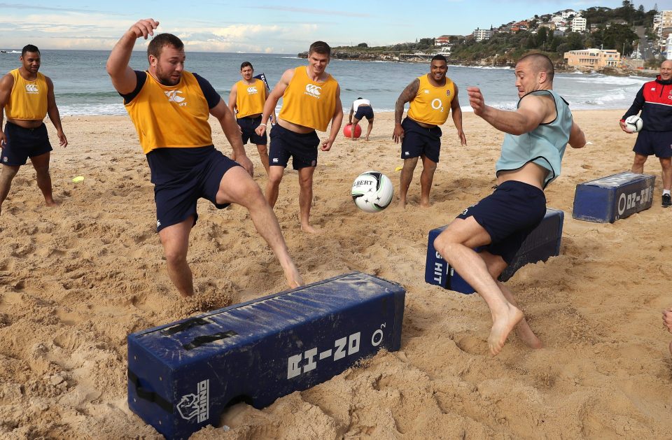 Matt Mullan (L) and Mike Brown contest the ball during the England recovery