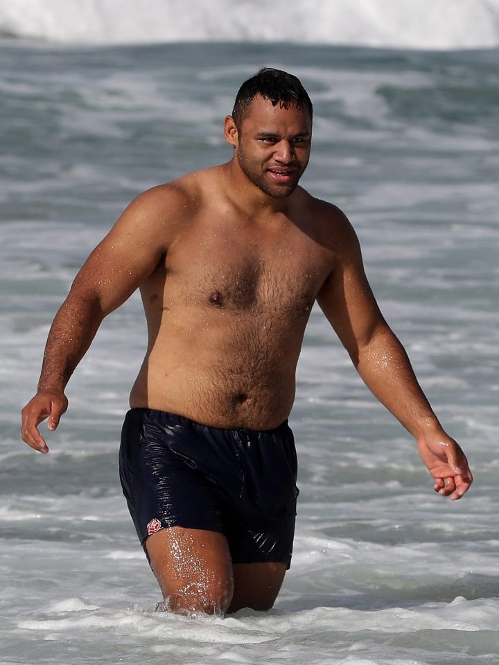 Billy Vunipola cools off in the ocean during the England recovery session