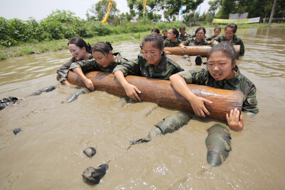 The are then forced to cling to logs as an endurance test in the chilly waters