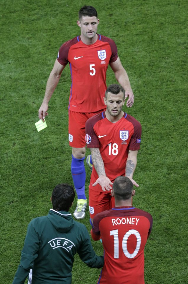 Jack Wilshere was replaced by Wayne Rooney in the second half after a poor game