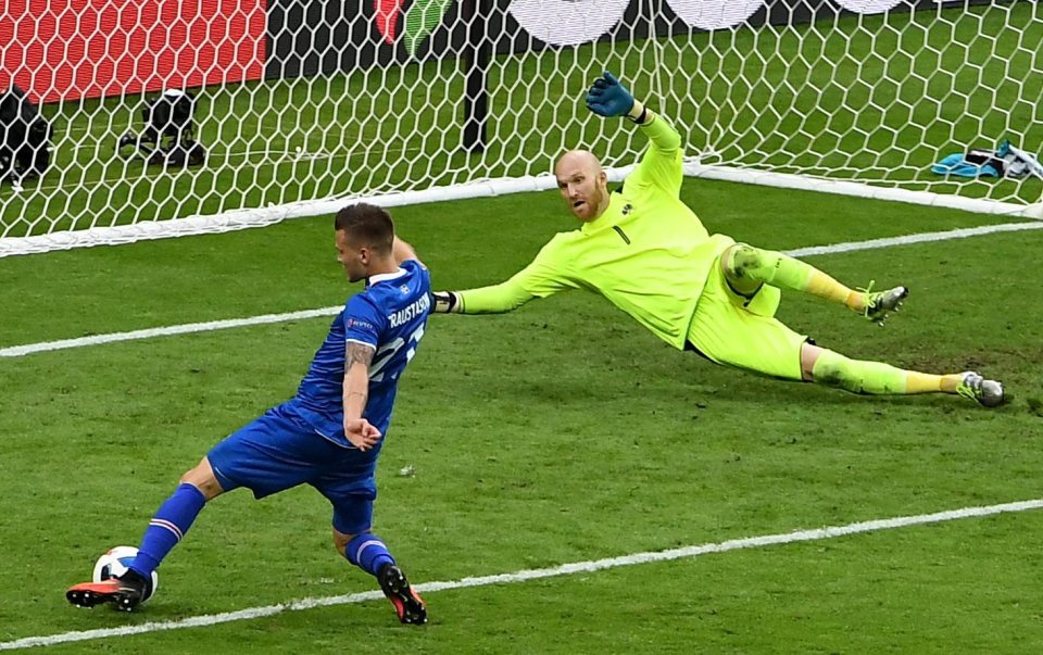 Arnor Traustason stretches to score the winner for Iceland against Austria