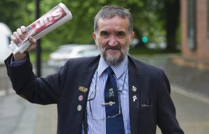 Pensioner bashes pub bouncer over the head with rolled up copy of The Sun