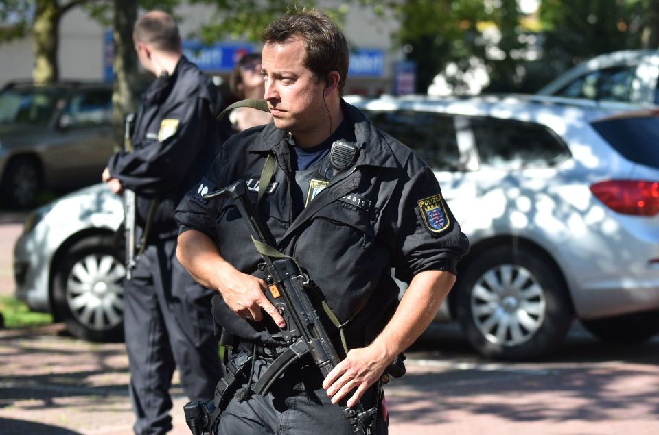 Reports say that the gunman let off tear gas, injuring as many as 50