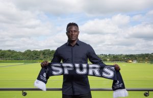 Victor Wanyama poses at Tottenham's Enfield training ground after signing
