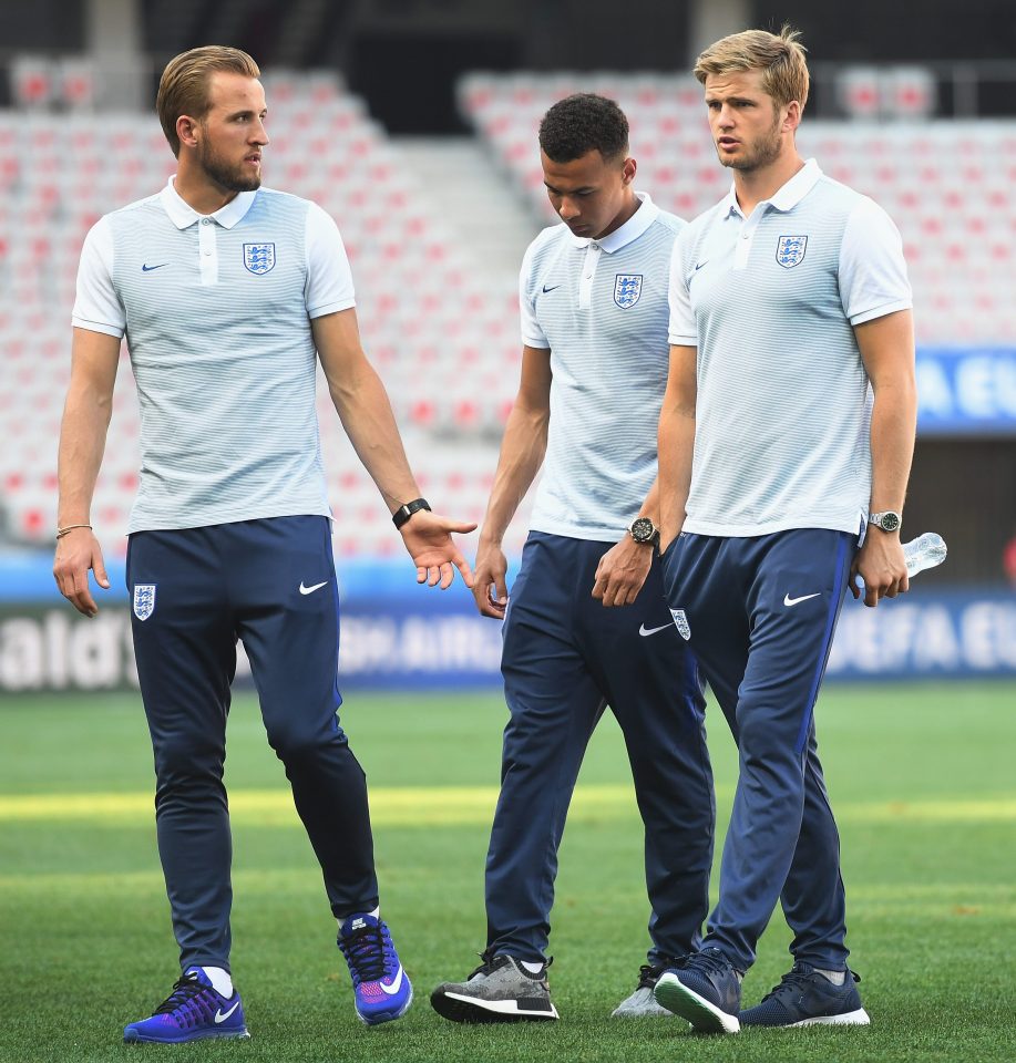 England's Harry Kane, Dele Alli and Eric Dier inspect the pitch in Nice