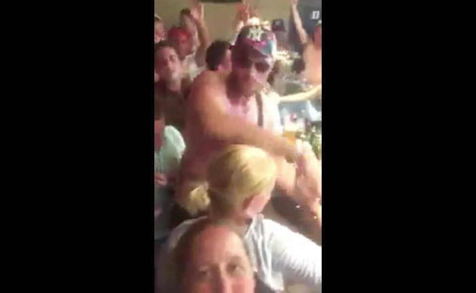 Tyson Fury passes over the 200 shots he bought for Three Lions fans ahead of the game