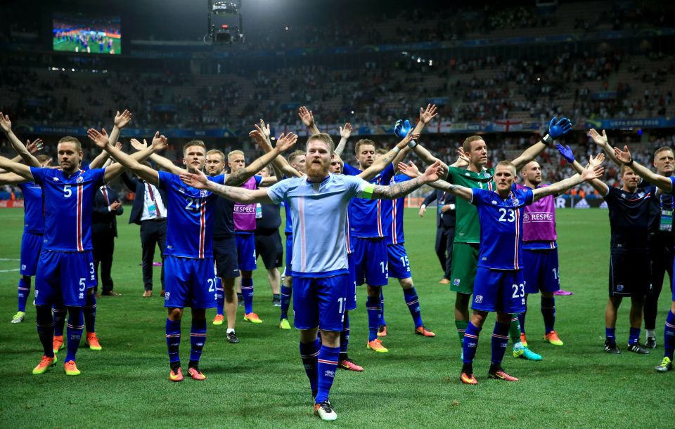 The Iceland players lead the chants after the game
