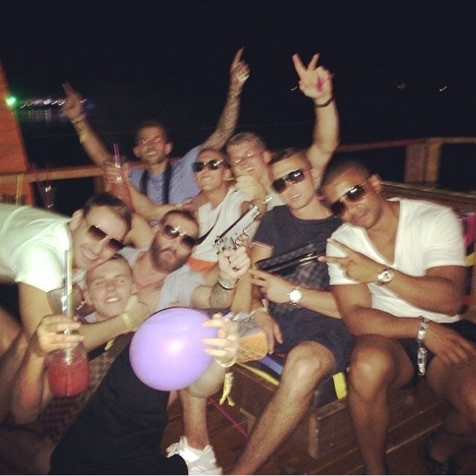 Several years ago Arthur was pictured with a group of friends, one of whom was brandishing a hand gun 