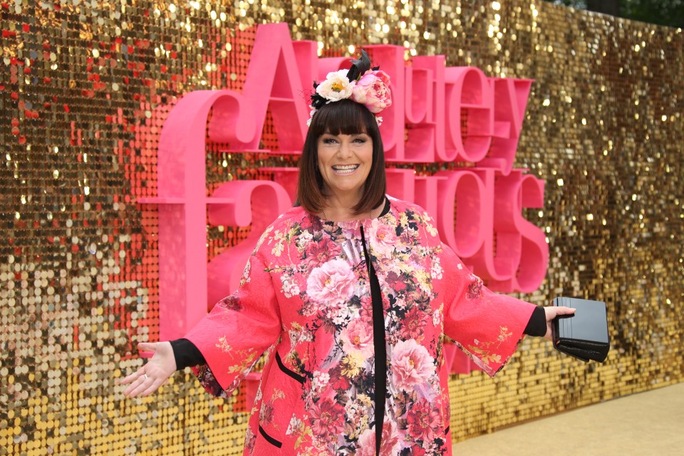Dawn French showed off her super-toned figure in a cute pink floral get-up