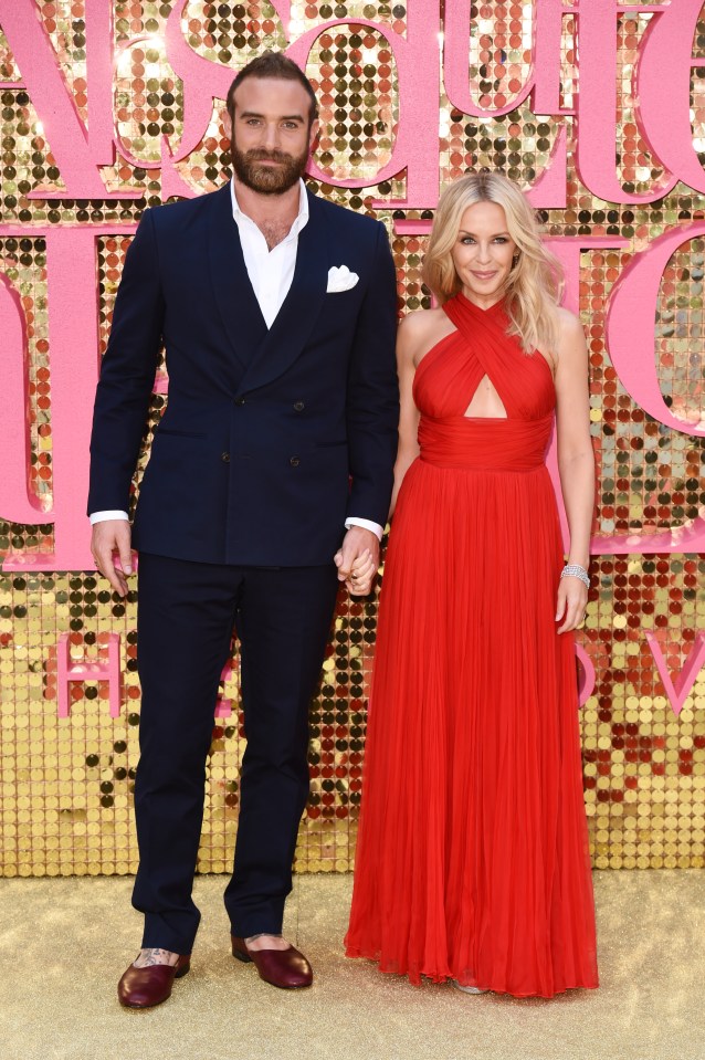Kylie and Joshua looked all loved up as they held hands on the red carpet