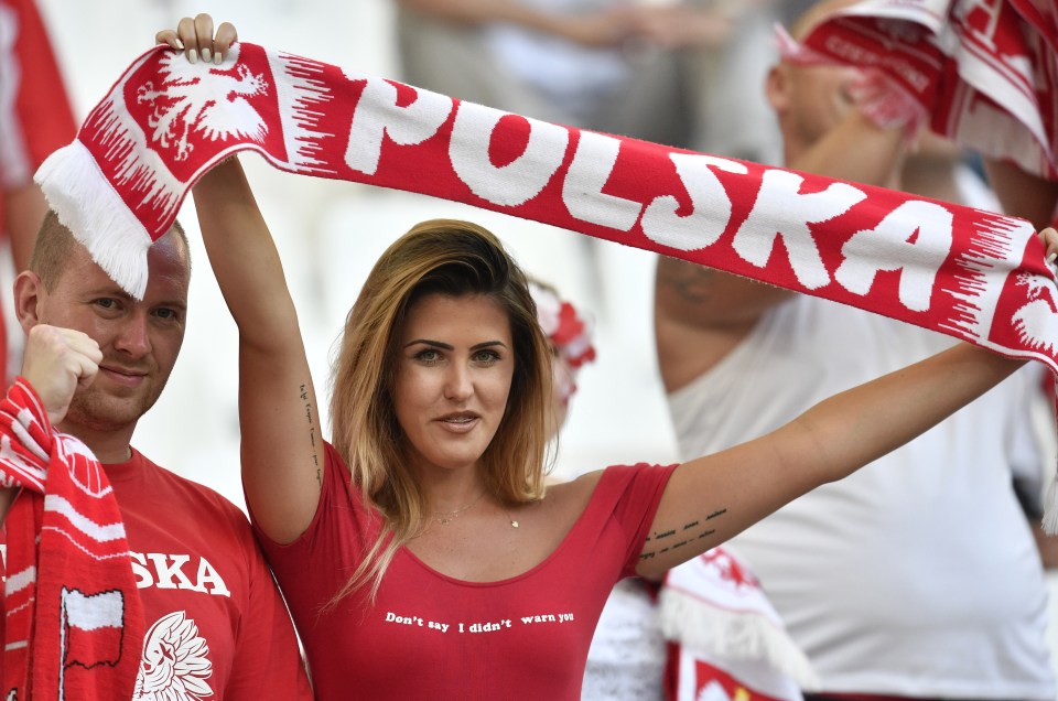 Another Poland fan shows her pride at her side reaching the Euros quarter-finals