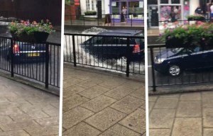 Watch the moment dopey motorist drives car into water forcing them to flee after freak flash flooding