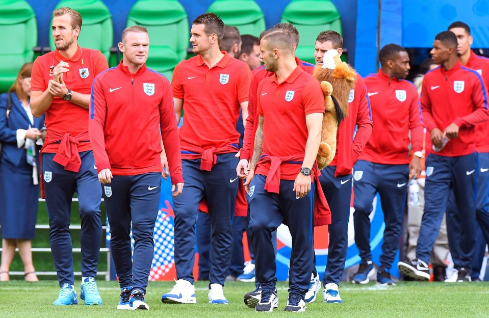  Joe Hart and Wayne Rooney check out the pitch ahead of the Group B finale against Slovakia 