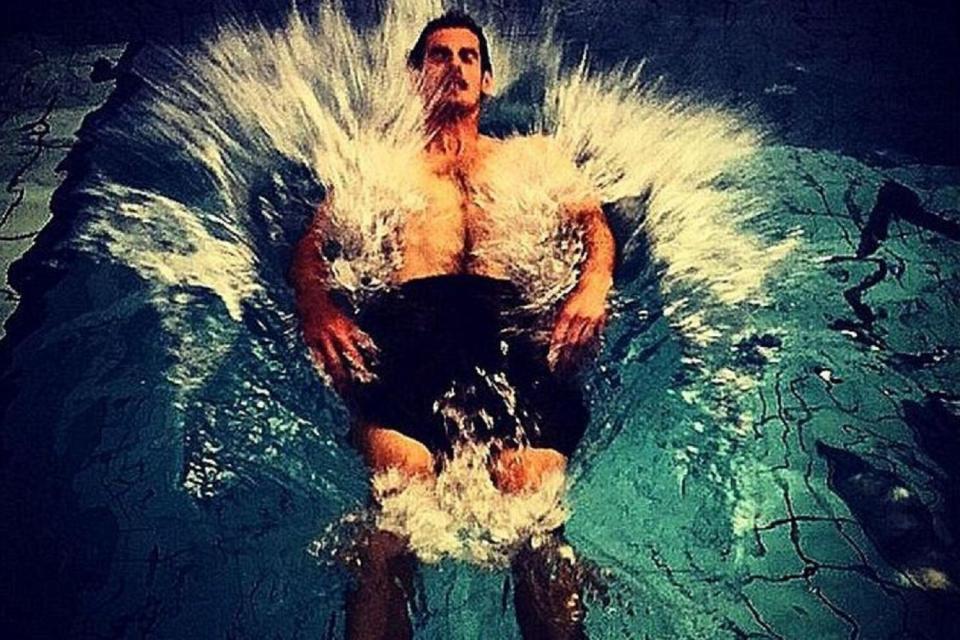 Murray warms his body back up with a dip in the hot tub