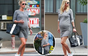 Nicky Hilton Rothschild shows off her bump as sister Paris says she 'can't wait to be an aunt'