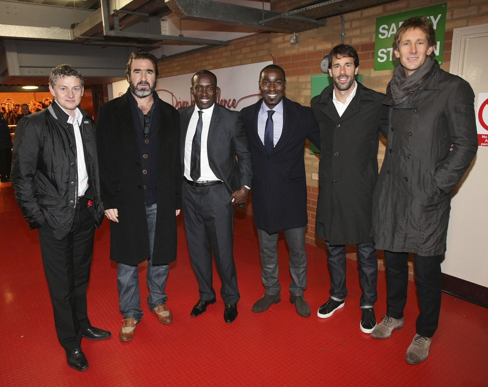 MANCHESTER, ENGLAND - NOVEMBER 23: Former players Ole Gunnar Solskjaer, Eric Cantona, Dwight Yorke, Andrew Cole, Ruud van Nistelrooy and Edwin van der Sar pose after the unveiling of a statue of Manager Sir Alex Ferguson of Manchester United at Old Trafford on November 23, 2012 in Manchester, England. (Photo by John Peters/Man Utd via Getty Images)