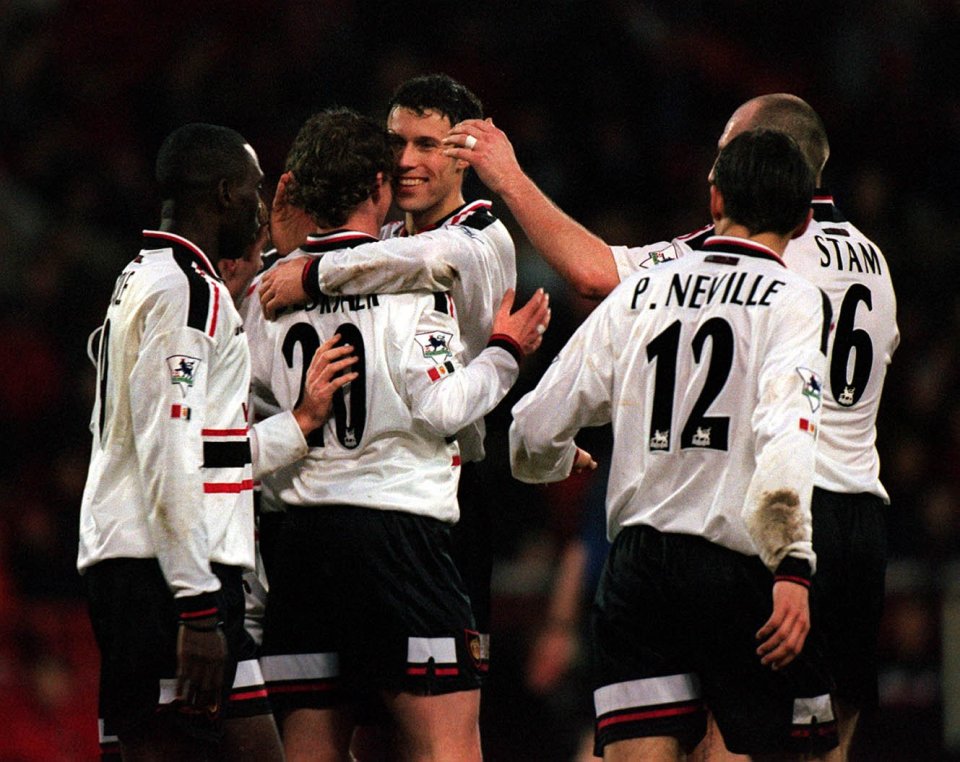 Headline: Ole, Ole, Ole,Ole Caption: AWESOME FOURSOME...Ole completes his 13-minute demolition job to his team-mates' delight NOTTINGHAM FOREST V MAN UTD. 6/02/99 PIC EDDIE KEOGH.OLE GUNNAR SOLSKJAER CELEBRATES AFTER HIS 4TH GOAL