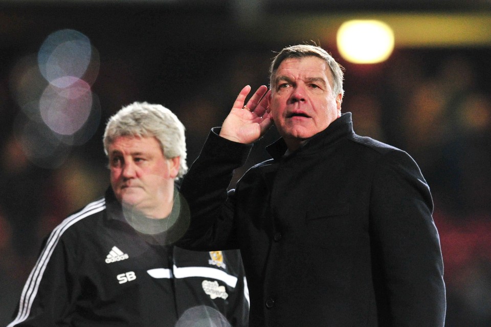 Sam Allardyce responds to the boos of the West Ham fans by cupping his ears after they beat ten-man Hull
