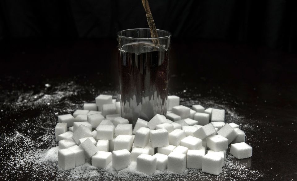 Can of coke with sugar