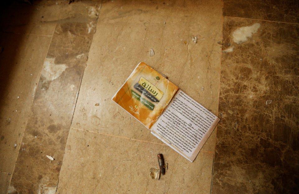 A discarded marriage document was one of many reminders pointing to the strict laws imposed upon residents by ISIS occupiers 