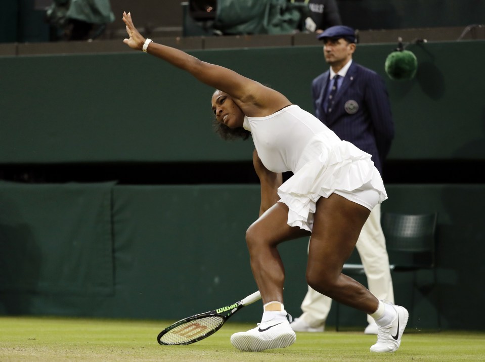 Serena Williams takes a fall in her touch match against a fellow American