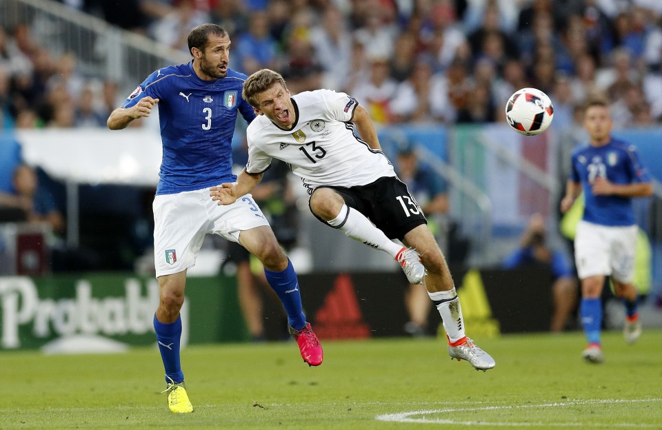 Football Soccer - Germany v Italy - EURO 2016 - Quarter Final - Stade de Bordeaux, Bordeaux, France - 2/7/16 Italy's Giorgio Chiellini in action with Germany's Thomas Muller REUTERS/Darren Staples Livepic