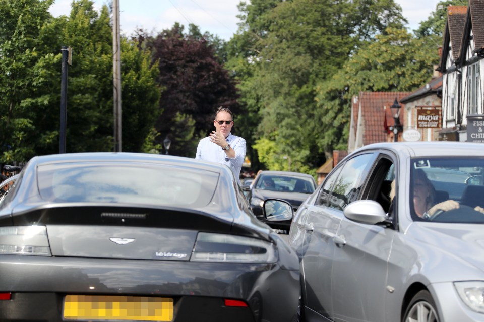 He became stranded on a narrow street filled with parked cars