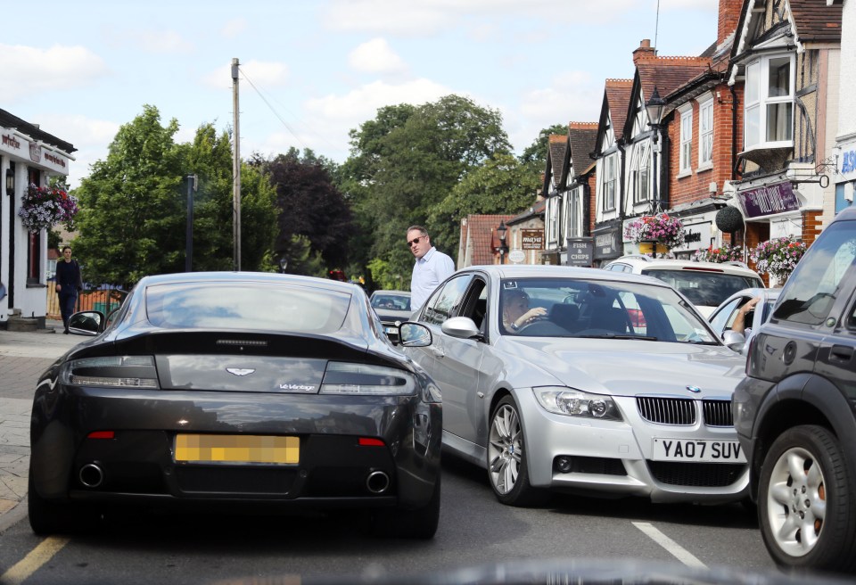 He managed to sandwich the car between the curb and oncoming traffic