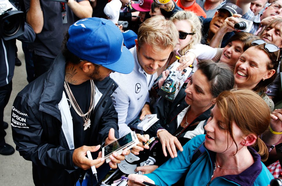Lewis Hamilton of Great Britain and Mercedes GP and Nico Rosberg