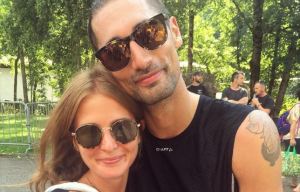 Millie Mackintosh hugs injured boyfriend Hugo Taylor at L'Étape du Tour finish line