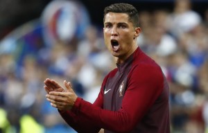 Football Soccer - Portugal v France - EURO 2016 - Final - Stade de France, Saint-Denis near Paris, France - 10/7/16 Portugal's Cristiano Ronaldo gives instructions from the sidelines REUTERS/Kai Pfaffenbach Livepic