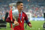 Cristiano Ronaldo holds the trophy after Portugal won Euro 2016