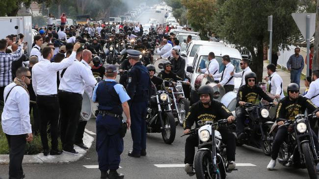 The couple’s wedding in Lidcombe involved helicopters, supercars, motorbikes, fighter jets and dancing drummers and closed off streets
