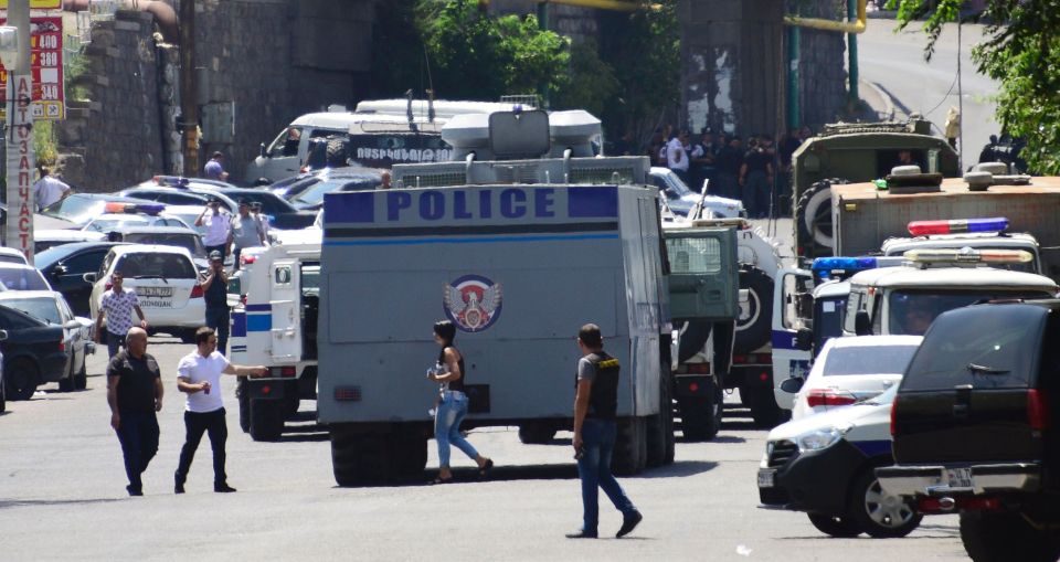 There are hostages inside the police station after a group stormed it early this morning