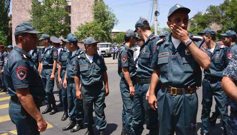 Armenian police officers block the streets to Erebuni 