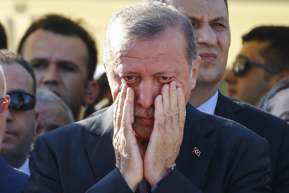 Turkey's controversial President Recep Tayyip Erdogan wept at the funerals of those killed in the coup
