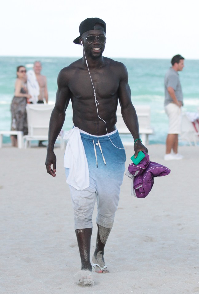 Bacary Sagna appeared to have recovered from a knee injury as he took to the beach with his family