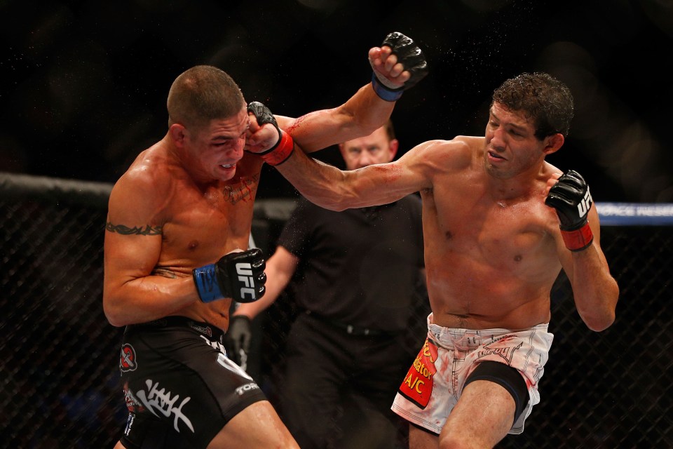 Fan favourite: Gilbert Melendez (right) engaged in a wild brawl with Diego Sanchez back in 2013