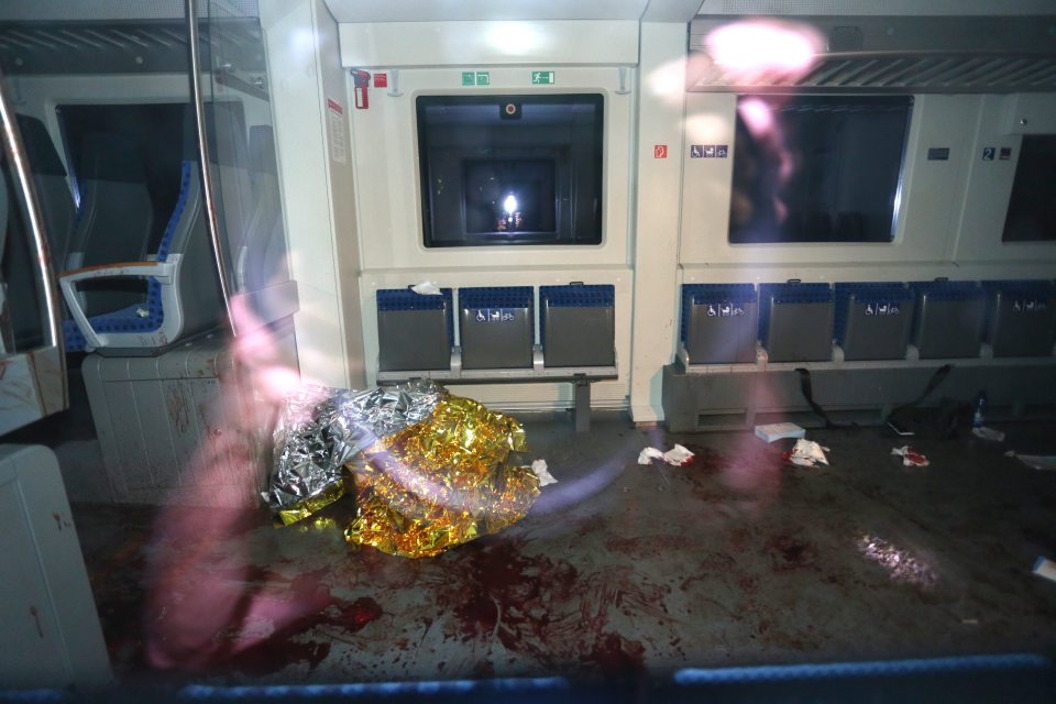 Axe attack . . . gory scenes inside train