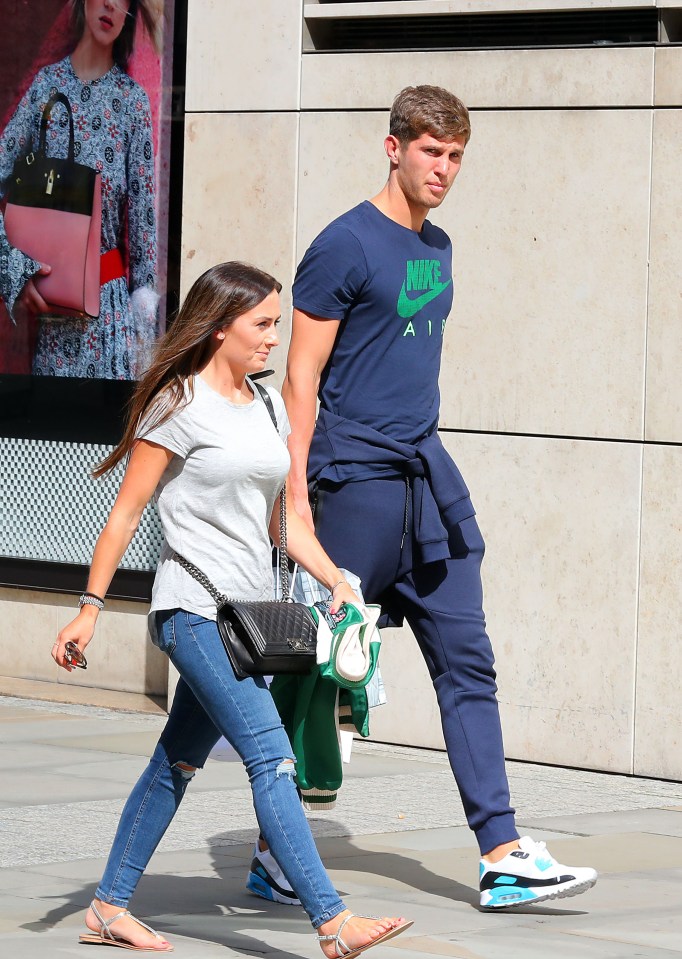 The player was accompanied by long-term partner Millie Savage