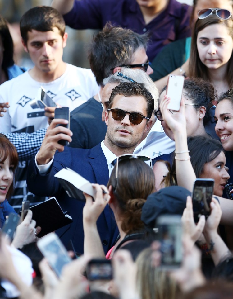 Actors Jamie Dornan and actress Dakota Johnson on the set 50 shades of grey at the Opera Garnier in Paris, France.