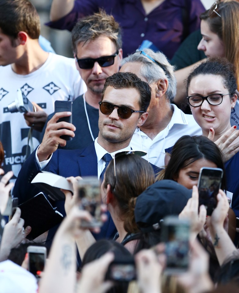 Actors Jamie Dornan and actress Dakota Johnson on the set 50 shades of grey at the Opera Garnier in Paris, France.