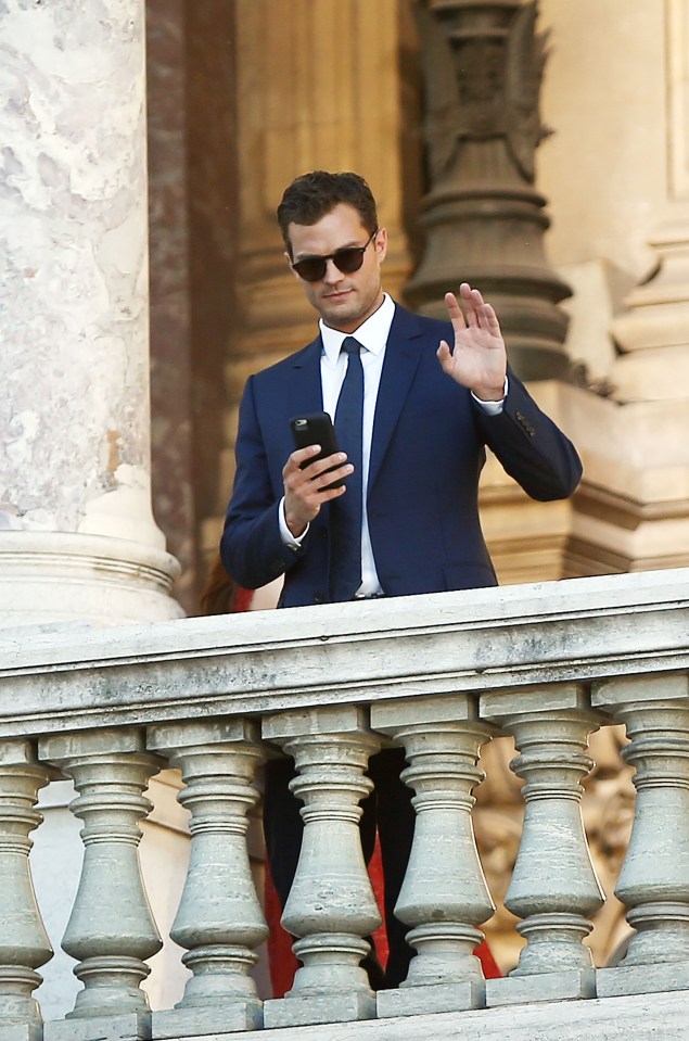 Actors Jamie Dornan and actress Dakota Johnson on the set 50 shades of grey at the Opera Garnier in Paris, France.