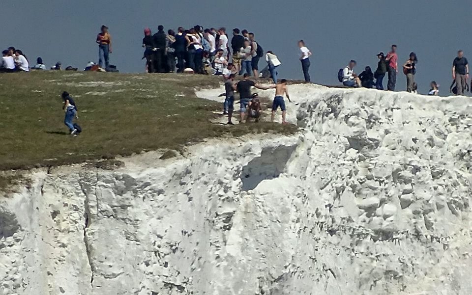 Despite giant cracks groups of tourists have been dicing with death on the edge of the limestone edifice