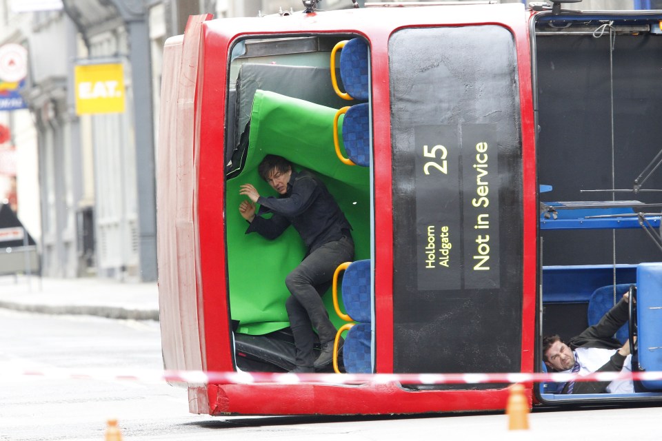  Tom Cruise Climbing Out Of A London Bus While Filming The Mummy