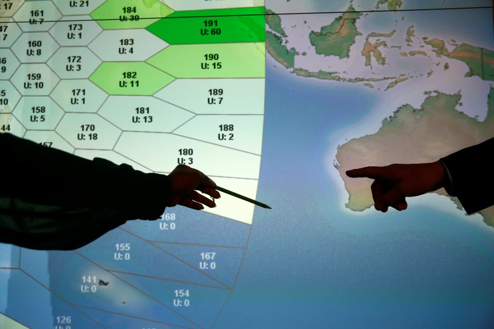 Satellite communications company Inmarsat point to a section of the screen showing the southern Indian Ocean 